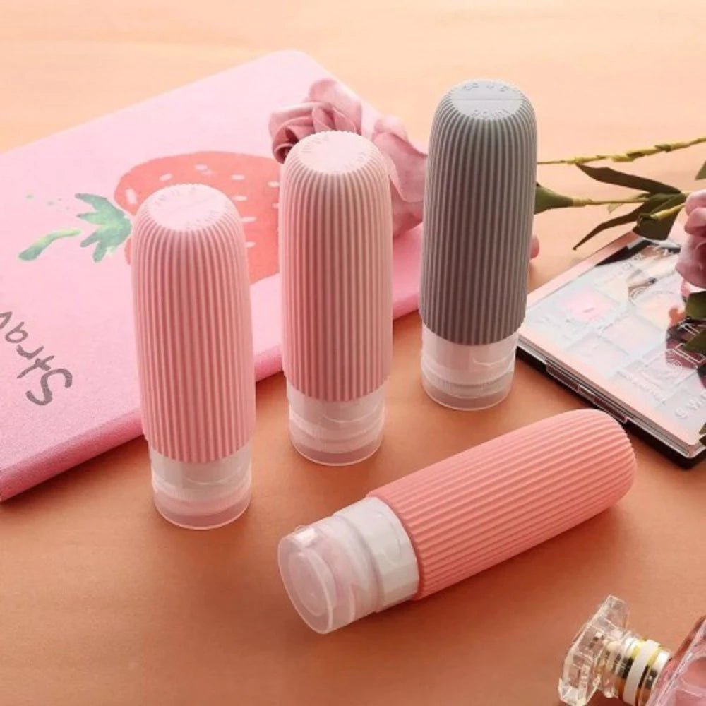 Frascos de silicone coloridos, práticos e reutilizáveis — perfeitos para viagens.